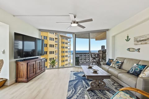 Spacious living room area, with an open floor plan, and access to the balcony.
