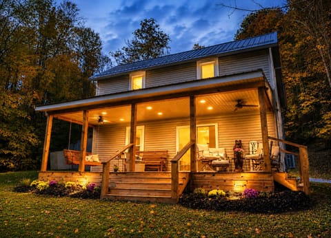 As the sun sets and the porch lights glow, the cabin transforms into the perfect place to slow down and reconnect. Sip your morning coffee on the swing, unwind with a glass of wine under the covered porch, or simply listen to the sounds of nature surrounding you.

Nestled among the trees yet close to all the adventures Hocking Hills has to offer, this peaceful retreat is where cozy evenings, star-filled skies, and unforgettable memories begin. Welcome to your home away from home.