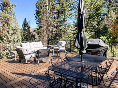 Our back deck is a nice hideaway with plenty of seating and a hot tub.