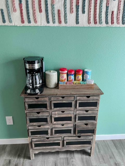 Coffee bar with sugars, creamer, and coffee provided