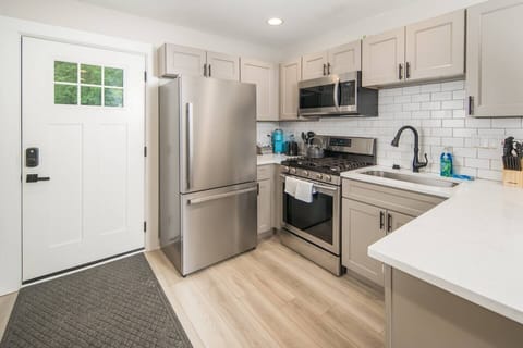 Updated well stocked kitchen with stainless steel appliances