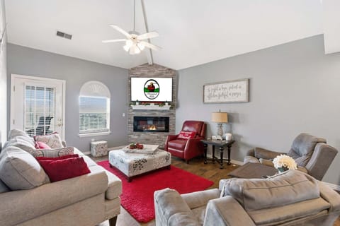 Living Area with Electric Fireplace, Cable TV, Sunroom Access