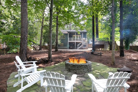 Welcome to your Raleigh retreat: stylish split-level with yard & fire pit.