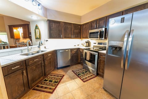 The kitchen is fully stocked with pots, pans and utensils!