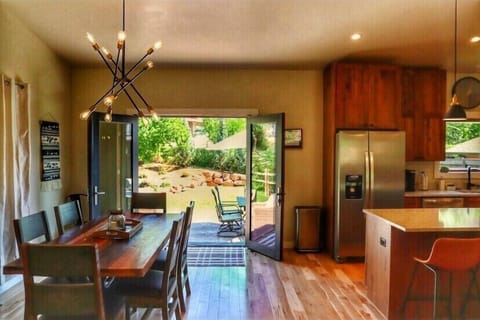 Bright dining area with french doors to the patio. 