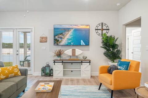 Main living room w/ 60" ROKU TV