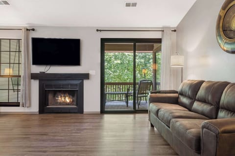 Condo, Multiple Beds, Balcony, Golf View (Golf View Serenity) | Living area | 42-inch flat-screen TV with digital channels, fireplace