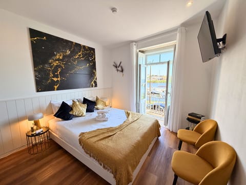 Ave Balcony Room | Individually decorated, blackout drapes, iron/ironing board, free WiFi