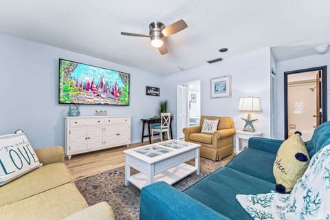 Living Room. 75" Smart TV. Sleeper Sofa. 