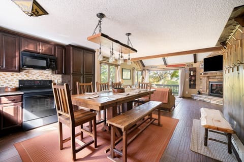 Comfortable eat in kitchen with seating for eight adults w/ access to living rm.