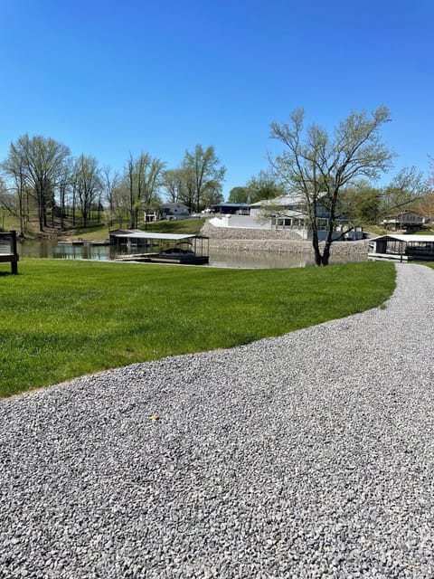 Parking and walkway for guest to the dock and Lake access and a slip