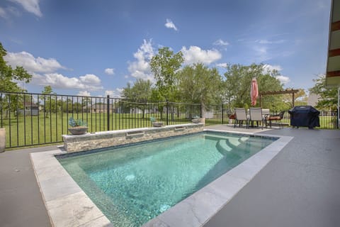 Spa pool (8' x 18' 3'6" to 4'6" deep) with outdoor seating/grill.