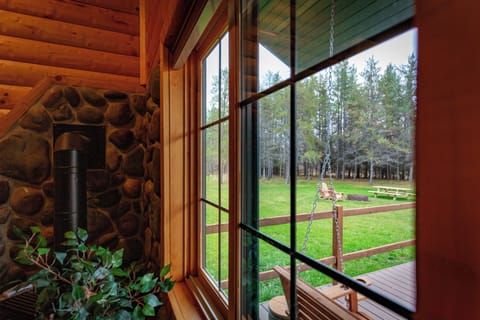 Beautiful view of the woods from the main room; catch a glimpse of deer crossing