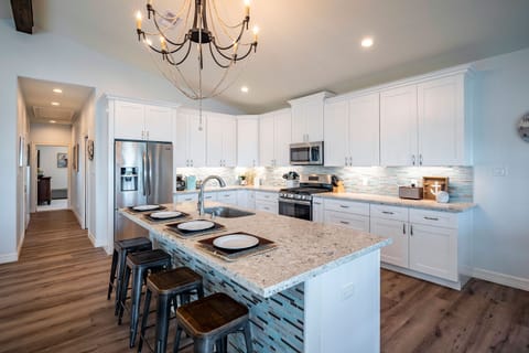 Hang out w/ friends at the bar top or turn around and catch the game or movie. 