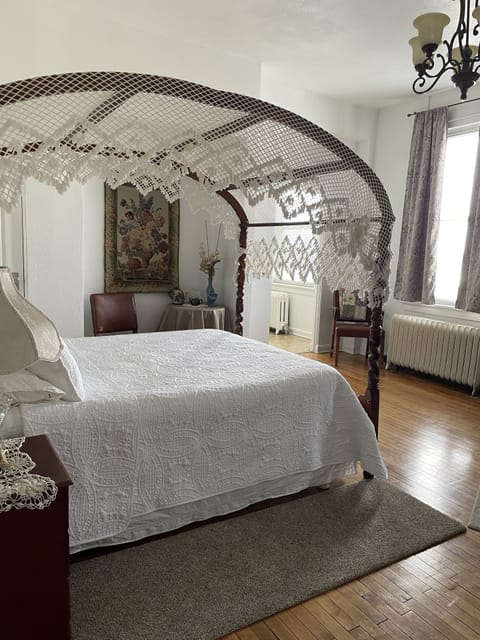 Queen size canopy bed.