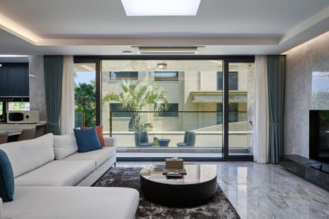 Premium Villa, 3 Bedrooms | Living area | 56-inch LCD TV with cable channels, TV, heated floors