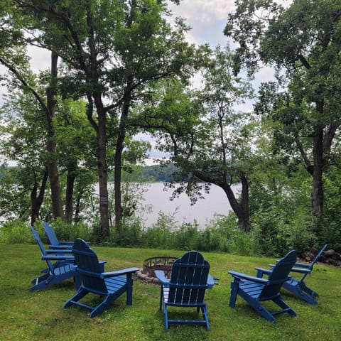 Relax & unwind with a fire while overlooking the lake