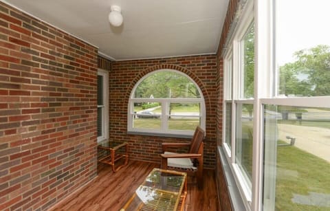 Spacious Sunroom! Relax and soak in the natural light in this airy, spacious sunroom. With plenty of room to unwind, read, or enjoy a cup of coffee, it’s the perfect spot to enjoy both the indoors and the outdoors.