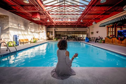 A heated pool, sun loungers