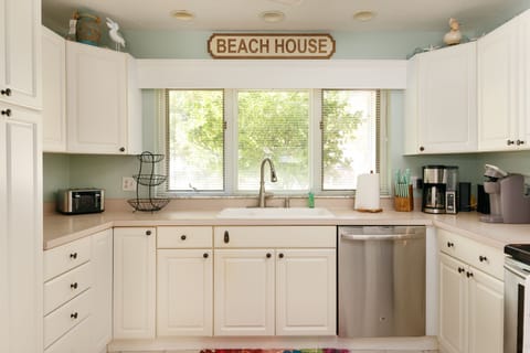 Fully Stocked Kitchen with Stainless Steel Appliances