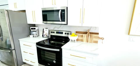 Clean and Fully Equipped Kitchen