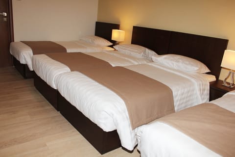 Standard Quadruple Room | In-room safe, free WiFi