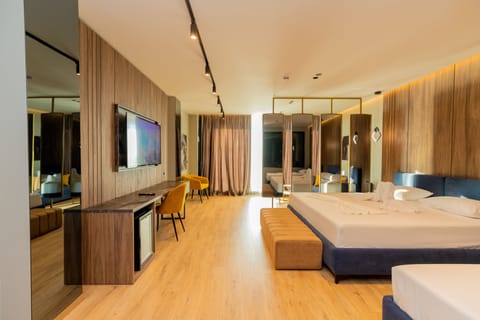 Deluxe Family Room | Minibar, in-room safe, soundproofing, free WiFi