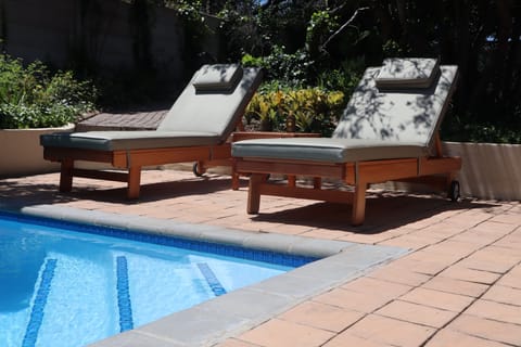 Sunbeds and Heated pool