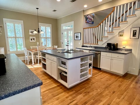 ADJACENT TO LIVING, OPEN KITCHEN AND DINING AREA