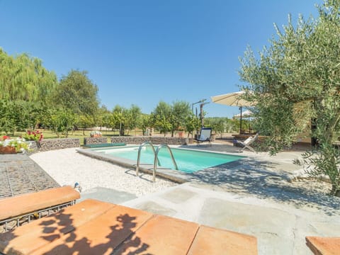 Water, Sky, Plant, Swimming Pool, Outdoor Furniture, Shade, Tree, Sunlounger, Leisure, Landscape