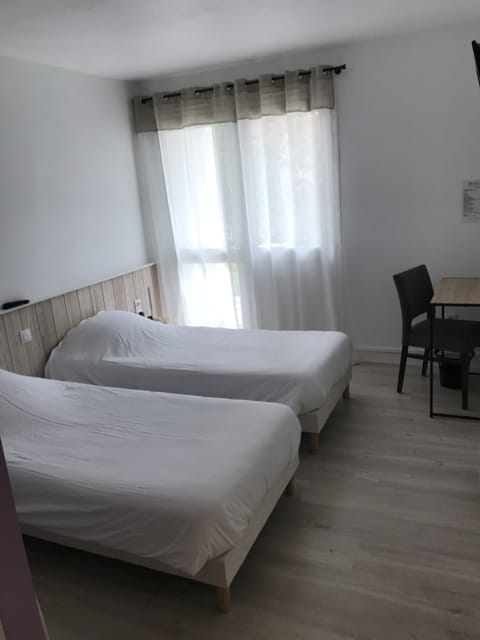 Twin Room | Individually furnished, desk, laptop workspace, free WiFi