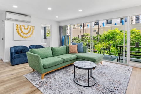 Private balcony with outdoor dining & peaceful tree-lined views.
