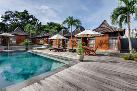 Outdoor pool, pool umbrellas, sun loungers