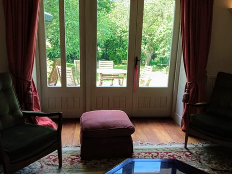 French doors opening onto private patio, into private garden.