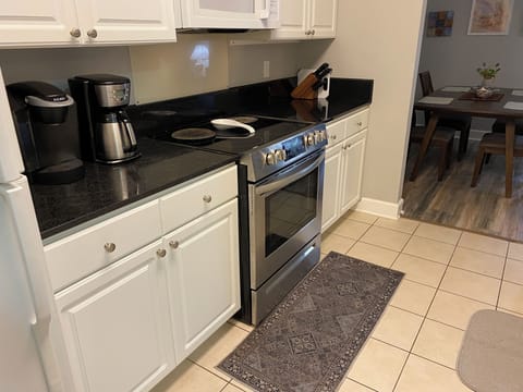 Fully Furnished Kitchen with utensils and a blender