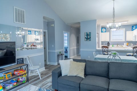 Large TV in a spacious living area