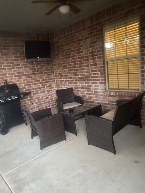 Back patio, enclosed in privacy fence., grill provided
