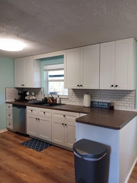 Kitchen with newly updated white cabinets