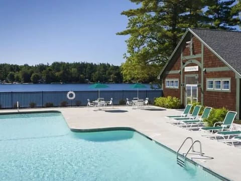 Heated pool next to gym, both overlooking the water.