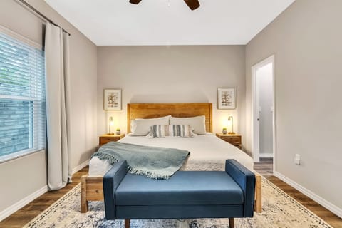 Bedroom #1 - Master King Bedroom with en-suite offers dual sinks, walk in shower, walk in closet, Smart TV and desk with high speed internet. Can also access deck from this bedroom.