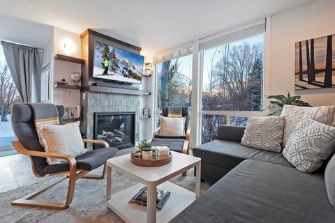 Living room: Gas fireplace, new HVAC and built-in humidifier, flat-screen TV
