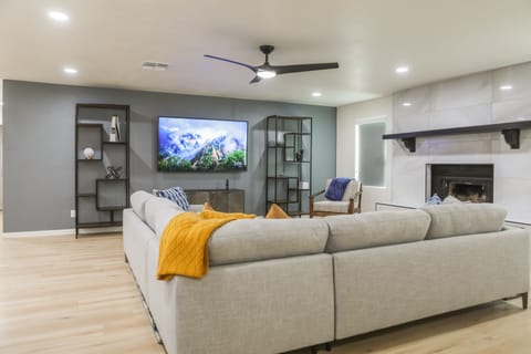 Large open living room with TV and streaming channels