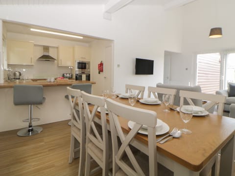 Fridge, electric kettle, cookware/dishes/utensils