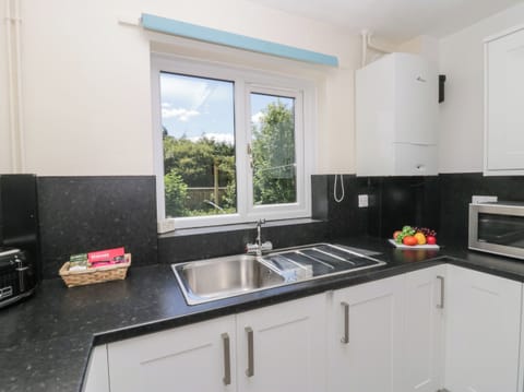 Fridge, electric kettle, toaster, cookware/dishes/utensils