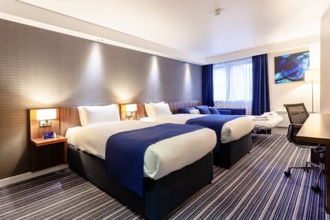 Standard Room, Multiple Beds (with Free Hot Breakfast) | Desk, laptop workspace, blackout drapes, iron/ironing board