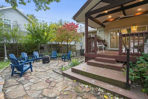 Back yard- Fully Fenced with covered deck and solo stove firepit. Not shown- Gas Grill