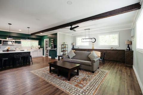 Upon entering you will find an open living/dining/kitchen area