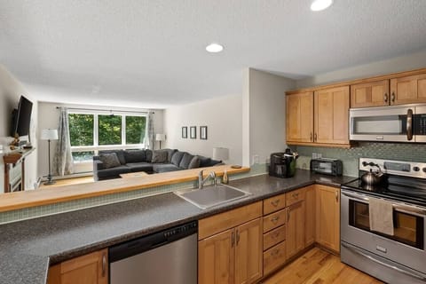 Open floorplan kitchen & living area.
