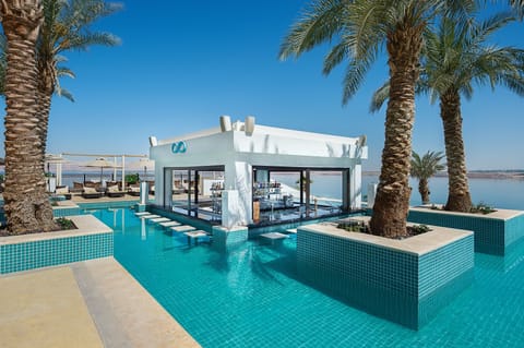 2 outdoor pools, open 7 AM to 7:30 PM, pool umbrellas, sun loungers
