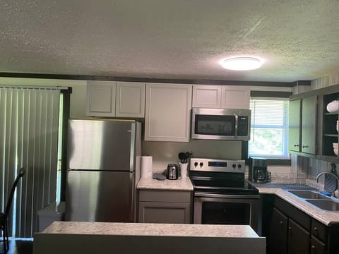 Cute little kitchen has all you need to cook and serve